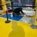 Vinyl floor restoration and installation in commercial retail facility in NYC