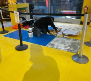 Vinyl floor restoration and installation in commercial retail facility in NYC