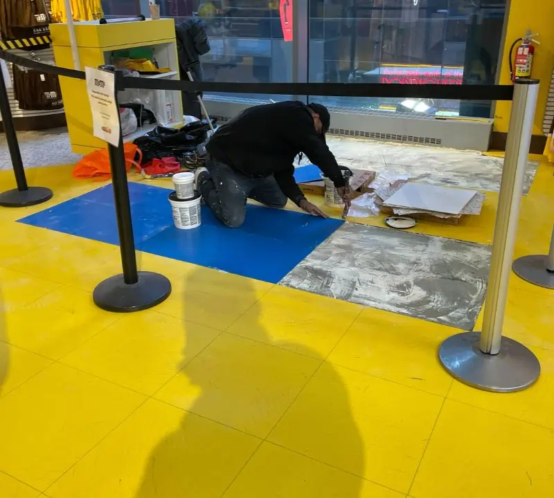 Vinyl floor restoration and installation in commercial retail facility in NYC